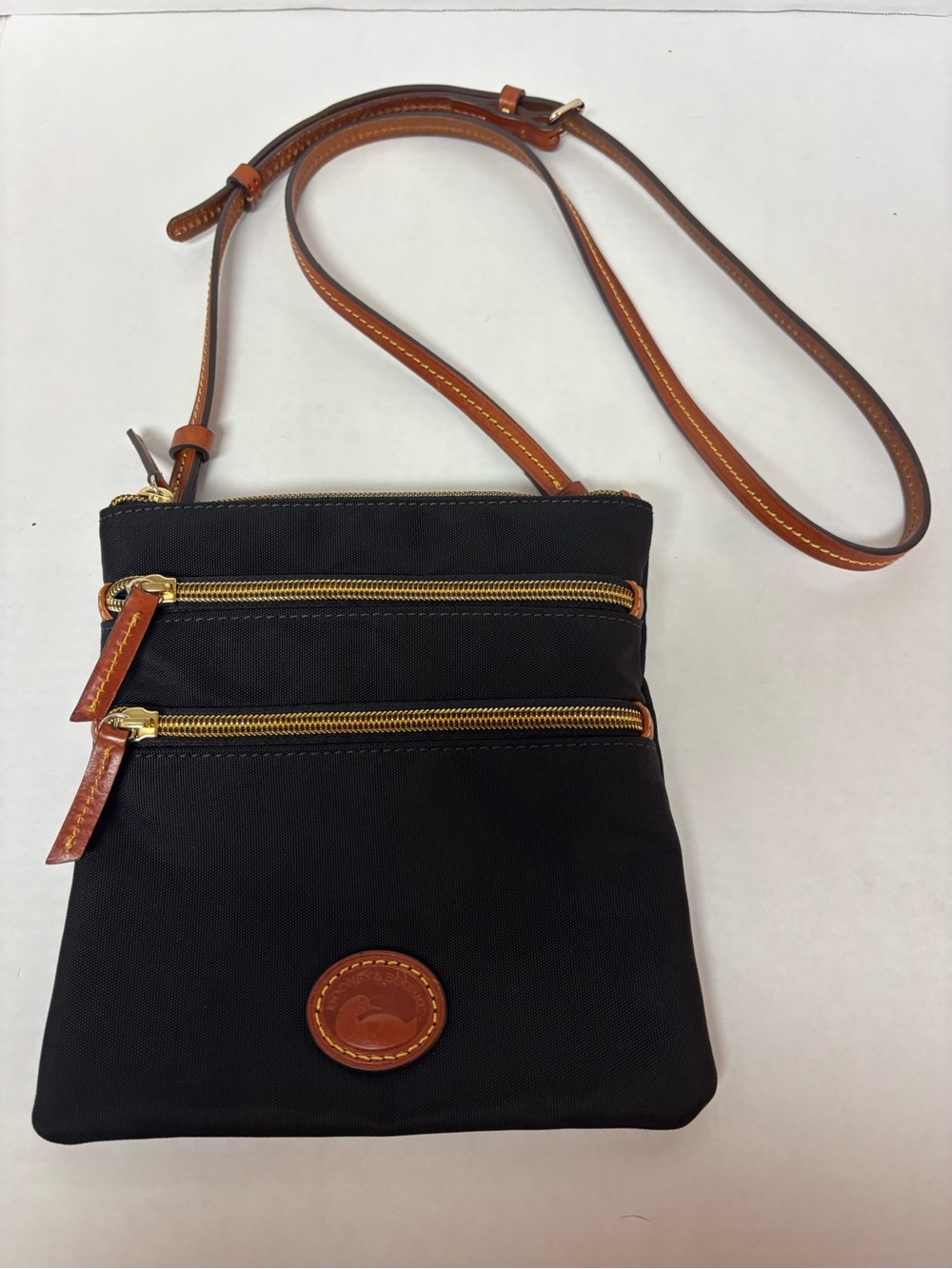Dooney & Bourke Black Crossbody with Brown Leather Trim and Gold Hardware
